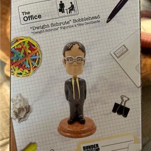 Dwight Shurutte from the tv show the office bobble head.
